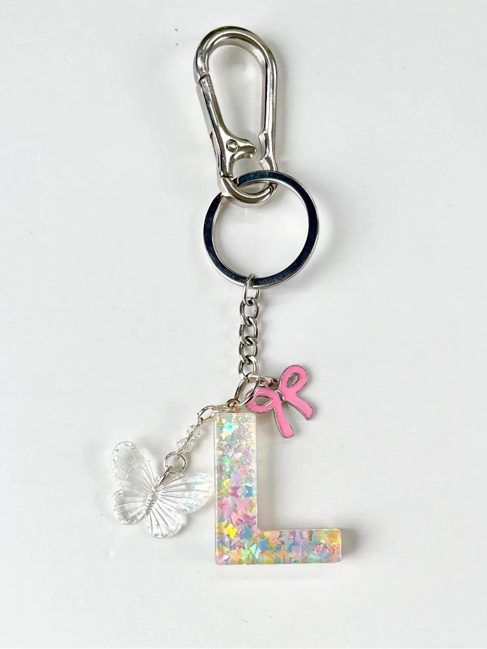 🦋 'L' Glitter Letter Keychain & Bag Charm with 🎀 Bow & Butterfly Accents